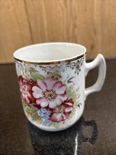 Alte Porzellan Tasse mit Rosen