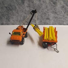 siku 2820- Unimog U 406 Rohrverleger mit Kran und 9 Rohre-1:55 - 70 iger  Jahre