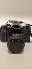 1/ Canon A-1 SLR Kamera +