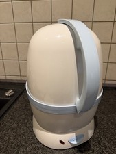 На изображении показан паровой стерилизатор NUK