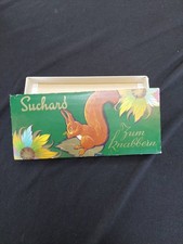 Papierdose Suchard Krachnuss