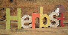 Schriftzug "Herbst" mit Igel