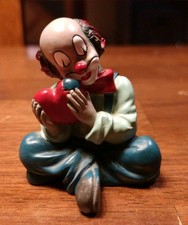 Gilde Clowns Figur sitzend mit