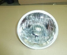 Scheinwerfereinsatz 7 Hella (Neuteil) H4,12V, links, Linksverkehr, 1L6002395-357