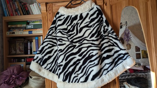 Poncho aus