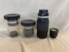 Four Assorted Camera Lenses