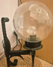 Schmiedeeiserne Wandleuchte mit Glasblase – rustikaler Charme