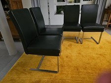 4 schwarze HÜLSTA Freischwinger mit Polsterung in Leder
