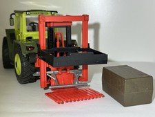 Siku Farmer 1:32 - 1960/3360 Siloblockschneider  Siloballen Heuballen