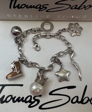 Winterliches Thomas Sabo Charm Armband Stiefel Schneeflocke Flügel Kronenperle 