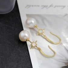 N06 earrings star with baroque
