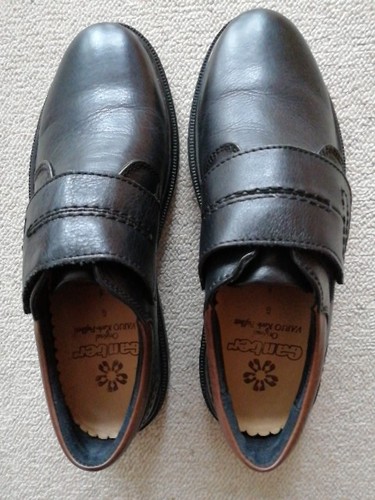 Paar schwarze leder - schwarze, leder-