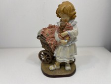 Dolfi Holz Figur "Erstes