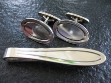 Manschettenknöpfe +