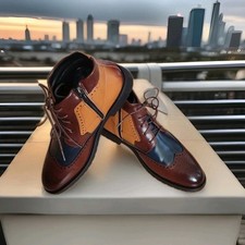 Oxford Boots mit Budapester Lochmuster aus Veganem Material.