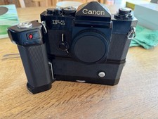 Canon 1 slr - w), f-1