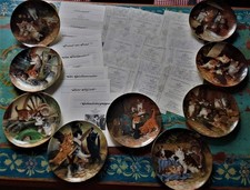 Neun katzen teller mit