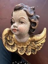 Engelskopf, Putte geschnitzt