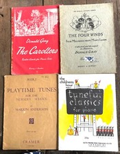 Vier Schulklavier Notenhefte