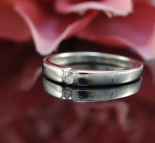 Christ Brillant Spann Ring in 333er / 8 Karat Weiß Gold XXYY