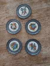 11 Stück Zinnuntersetzer