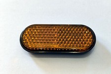 Mini Seiten Reflektor Rückstrahler orange Katzenauge selbstklebend KFZ oval