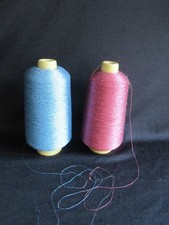 ?XL-Spulen mit ganz viel feines Metallic-Beilaufgarn / Mitstrickgarn  2 Farben