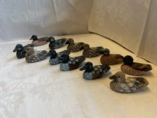 12 kleine Enten aus Holz