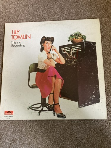 Lily tomlin this - "this, a