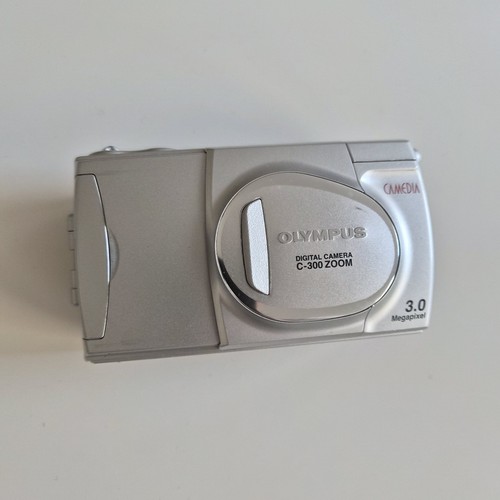 Olympus 300 zoom - olympus,