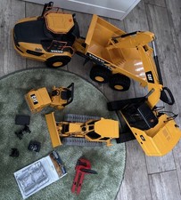 Bruder Fahrzeuge Baustelle Set Volvo Dumper, CAT Walze, CAT Schaufelbagger Uvm!