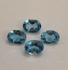 1x Topas - Oval  facettiert 'swissblue' 6x8mm