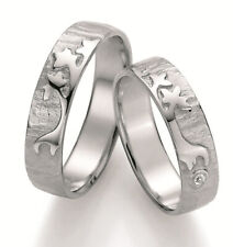 Paar Silberringe mit Brillant