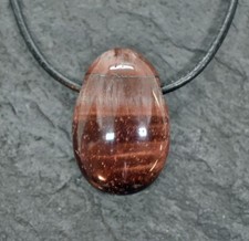 KATZENAUGE TIGERAUGE-ROT