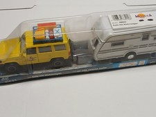 Modellauto Auto mit Wohnwagen Caravan trailer Happy People