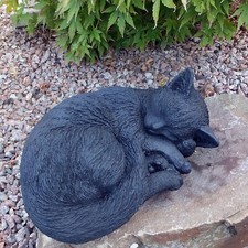 Steinfigur schwarzer Kater