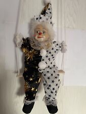 Harlekin Figur auf einer