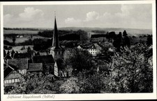 Ak Ruppichteroth Rhein Sieg Kreis, Teilansicht mit Kirche - 2978404