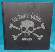 Backyard Babies - Them XX. 3 CDs, DVD im Buch.