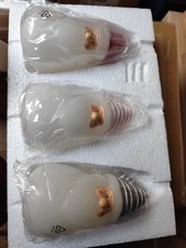 3 Weihnachtsmänner aus Wachs