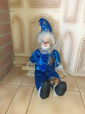 Harlekin auf Schaukel