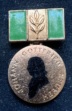 DDR Orden -  Johann Gottfried Herder Medaille -  1957 Bronze  GDSF Freundschaft
