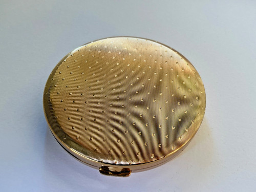 Puderdose rund goldfarben