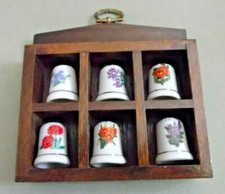 6 Fingerhüte im Setzkasten