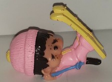 Vintage pink skier Skiing