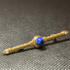 vergoldete Stab-Brosche mit