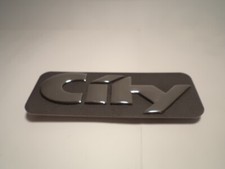 Schriftzug Emblem "CITY" Astra F ORIGINAL OPEL 172782 90541657 in OVP