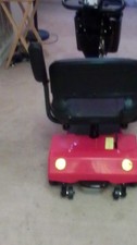Red 4-Wheeled Mobility Scooter