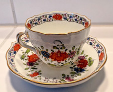 Meissen Moccatasse und Untertasse Blumen 1. Wahl mit Chip auf der Untertasse