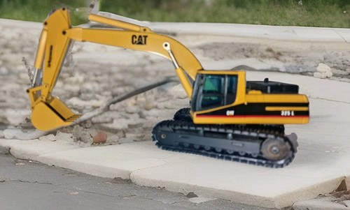Löffelbagger cat 325l - cat,